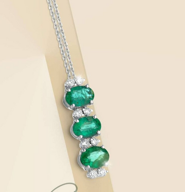 Pendant in 18k white gold with natural diamonds and emeralds SD100001
